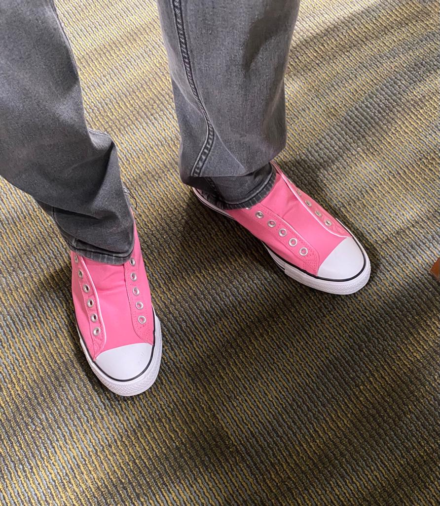 Thom's new sneakers which are pink